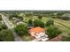 This aerial view showcases the golf course behind the home, highlighting the roof's color at 2813 Ballard Ave, Orlando, FL 32833