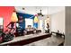 Custom bar featuring decorative lighting, counter seating, and various decorations at 2813 Ballard Ave, Orlando, FL 32833