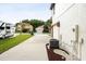 Long driveway leading to a well-maintained home with an RV and manicured landscaping at 2813 Ballard Ave, Orlando, FL 32833