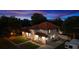 This exterior elevation boasts lush landscaping, a red tile roof, and an RV at 2813 Ballard Ave, Orlando, FL 32833