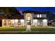Charming single-Gathering home with a grand entryway framed by elegant columns and arched windows at 2813 Ballard Ave, Orlando, FL 32833