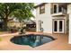 Private pool area with an outdoor kitchen and dining space perfect for entertaining guests at 2813 Ballard Ave, Orlando, FL 32833