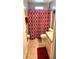 Bathroom with tile flooring, a shower with a curtain, vanity with sink and tiled walls at 2820 Tamarind Dr, Edgewater, FL 32141