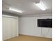 Bonus room featuring a TV and new carpet at 2820 Tamarind Dr, Edgewater, FL 32141