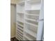 Walk in closet featuring custom shelving for ample storage at 2820 Tamarind Dr, Edgewater, FL 32141