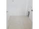 Bright laundry room with tile flooring and neutral paint, ready for appliances at 2820 Tamarind Dr, Edgewater, FL 32141