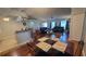 Spacious living room with dining area, offering ample natural light and comfortable seating at 2820 Tamarind Dr, Edgewater, FL 32141