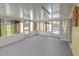 Enclosed sunroom with lots of windows, offering views of the pool and backyard at 2820 Tamarind Dr, Edgewater, FL 32141