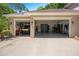 Spacious garage featuring two bays, ample storage, high ceilings and a variety of equipment at 305 Country Circle E Dr, Port Orange, FL 32128