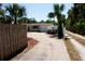 Charming single-story house with a long driveway and boat in front of garage at 3732 Cardinal Blvd, Port Orange, FL 32127