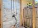 Custom outdoor shower featuring decorative tile surround and copper plumbing at 4219 Oriole Ave, Port Orange, FL 32127