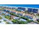 Aerial view featuring the condo complex with beach access and manicured landscape on a clear day at 4752 S Atlantic Ave # 1, Ponce Inlet, FL 32127
