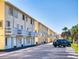 Street view of residential multi-Gathering building with garage doors and car parked in front at 4752 S Atlantic Ave # 1, Ponce Inlet, FL 32127