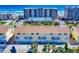 Beachfront condos showcase balconies, lush palms, and ocean views in this sunny complex at 4752 S Atlantic Ave # 1, Ponce Inlet, FL 32127