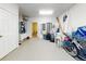 Tidy garage interior with storage, a utility door, and access to the main home at 4752 S Atlantic Ave # 1, Ponce Inlet, FL 32127