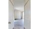 Hallway view of the living room with blue wood floors and white trim at 4752 S Atlantic Ave # 1, Ponce Inlet, FL 32127