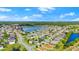 Overhead view of a lakeside community with houses, ponds, and lush greenery at 5304 Cordgrass Bend Ln, Port Orange, FL 32128