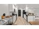 Well-lit kitchen with granite countertops, stainless steel appliances, and white cabinetry at 5304 Cordgrass Bend Ln, Port Orange, FL 32128