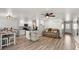Spacious living room with an open layout to the kitchen and dining area at 5304 Cordgrass Bend Ln, Port Orange, FL 32128