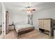Comfortable main bedroom with ceiling fan, natural light, and neutral decor at 5304 Cordgrass Bend Ln, Port Orange, FL 32128