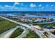 Overhead shot featuring condos with water access, surrounded by bridges and lush landscapes at 650 S Pine St, New Smyrna Beach, FL 32169