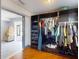 Spacious walk-in closet with ample storage and a glimpse into a bright bedroom at 650 S Pine St, New Smyrna Beach, FL 32169