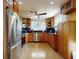 Expansive kitchen featuring stainless steel appliances, granite counters and great cabinet space at 650 S Pine St, New Smyrna Beach, FL 32169