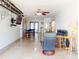 Open-concept living area with a dining and bar area offering a versatile layout at 650 S Pine St, New Smyrna Beach, FL 32169