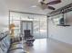 Bright living room with comfortable seating and abundant natural light from large glass doors at 650 S Pine St, New Smyrna Beach, FL 32169