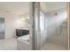 Bathroom featuring double vanity, soaking tub, and glass-enclosed shower at 6808 Forkmead Ln, Port Orange, FL 32128