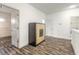 Bonus room area features hardwood floors and cabinet at 6808 Forkmead Ln, Port Orange, FL 32128