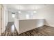 Bright hallway featuring hardwood floors and ample space at 6808 Forkmead Ln, Port Orange, FL 32128