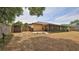 Home and shed surrounded by yard at 1119 Wild Oak Ter, Deland, FL 32720