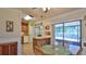 Eat-in kitchen features modern appliances and a breakfast table overlooking the landscaped backyard at 1119 Wild Oak Ter, Deland, FL 32720
