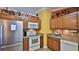 Fully equipped kitchen features stainless steel appliances, ample counter space, and modern fixtures at 1119 Wild Oak Ter, Deland, FL 32720