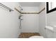 Bright bathroom featuring a tiled walk-in shower with modern fixtures and a neutral color scheme at 126 Brandy Hills Dr, Port Orange, FL 32129