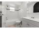 Tiled bathroom featuring a shower-tub combination with modern fixtures, a toilet, and a vanity at 126 Brandy Hills Dr, Port Orange, FL 32129