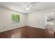 Bedroom with hardwood floors, neutral paint, and lots of natural light at 126 Brandy Hills Dr, Port Orange, FL 32129