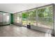 Bright lanai with tiled floor, view of the yard, and access to the outdoors at 126 Brandy Hills Dr, Port Orange, FL 32129