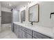Stylish bathroom boasts dual vanities, modern fixtures, and elegant finishes at 1371 Melonie Trl, New Smyrna Beach, FL 32168