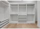 Spacious walk-in closet with custom shelving and drawers, perfect for organization at 1371 Melonie Trl, New Smyrna Beach, FL 32168