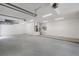 Spacious, well-lit garage offering ample storage and parking space at 1371 Melonie Trl, New Smyrna Beach, FL 32168