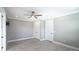 Spacious bedroom featuring a ceiling fan, recessed lighting, wood-style floors, and neutral wall color at 1787 Earhart Ct, Port Orange, FL 32128