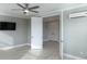 Bedroom with a mounted television, recessed lighting, ceiling fan and adjoining room at 1787 Earhart Ct, Port Orange, FL 32128
