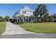 Charming two-story home with well-maintained lawn and inviting front yard at 1787 Earhart Ct, Port Orange, FL 32128