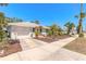 Inviting home boasts a tidy yard, quaint entrance, and a convenient one-car garage at 208 Crawford Rd, New Smyrna Beach, FL 32169