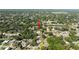 The arrow points to this house among a densely populated neighborhood in an aerial view at 2204 Kumquat Dr, Edgewater, FL 32141