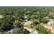 A wide aerial of the neighborhood surrounding the property, showing lots of trees and houses at 2204 Kumquat Dr, Edgewater, FL 32141