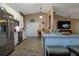 Bright kitchen showcasing a central island, stainless steel appliances, and modern finishes at 2204 Kumquat Dr, Edgewater, FL 32141