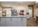 Well-equipped kitchen featuring stainless steel appliances, modern cabinets, and a spacious island at 2204 Kumquat Dr, Edgewater, FL 32141